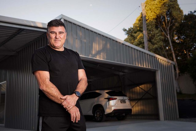 Tony in front of his new double garage