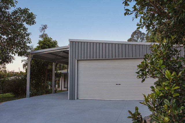 Double skillion garage with double roller door down