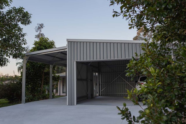 Double skillion garage with lean-to carport