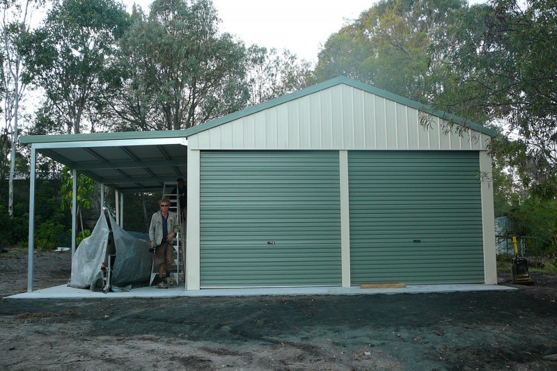 Double garage with awning twin roller doors